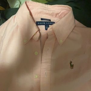 Pink button up shirt. Worn once no stains